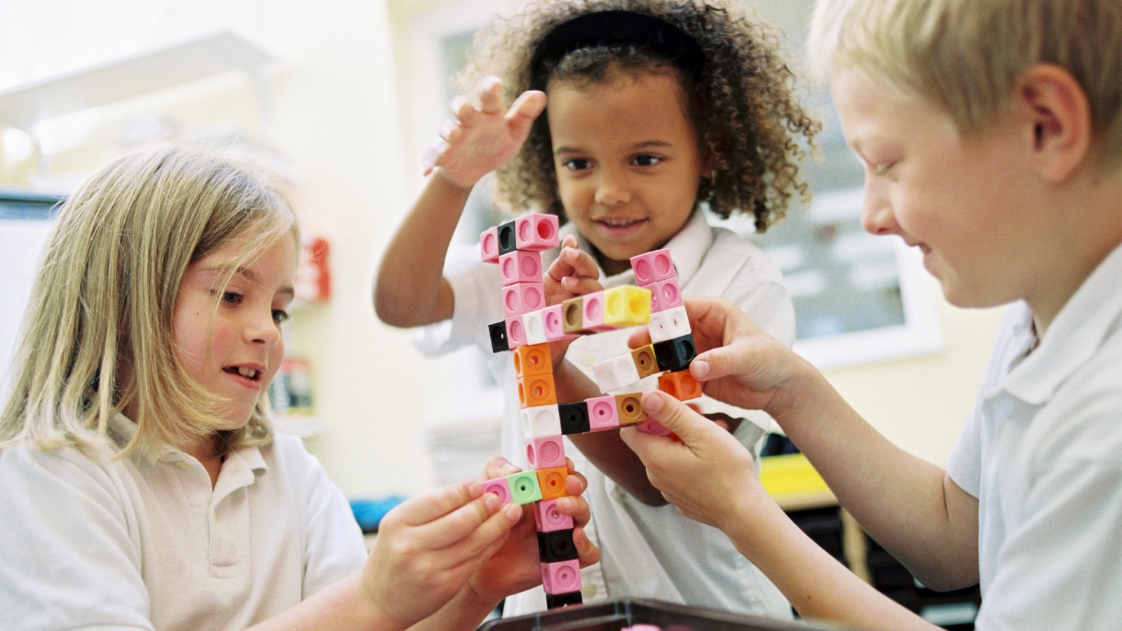 Stages of Play - How toddlers learn to play with toys and each