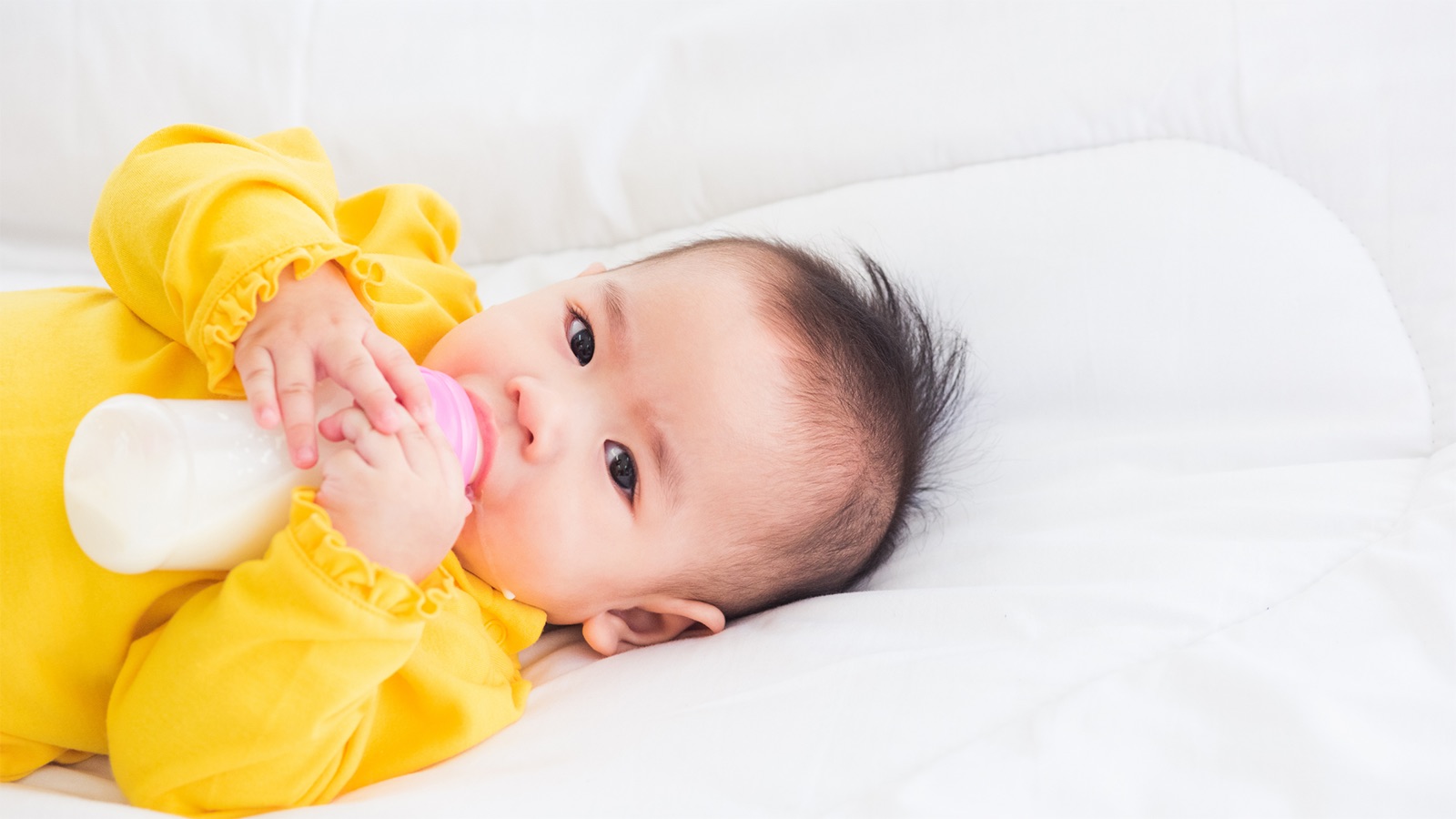 3-month old baby with bottle